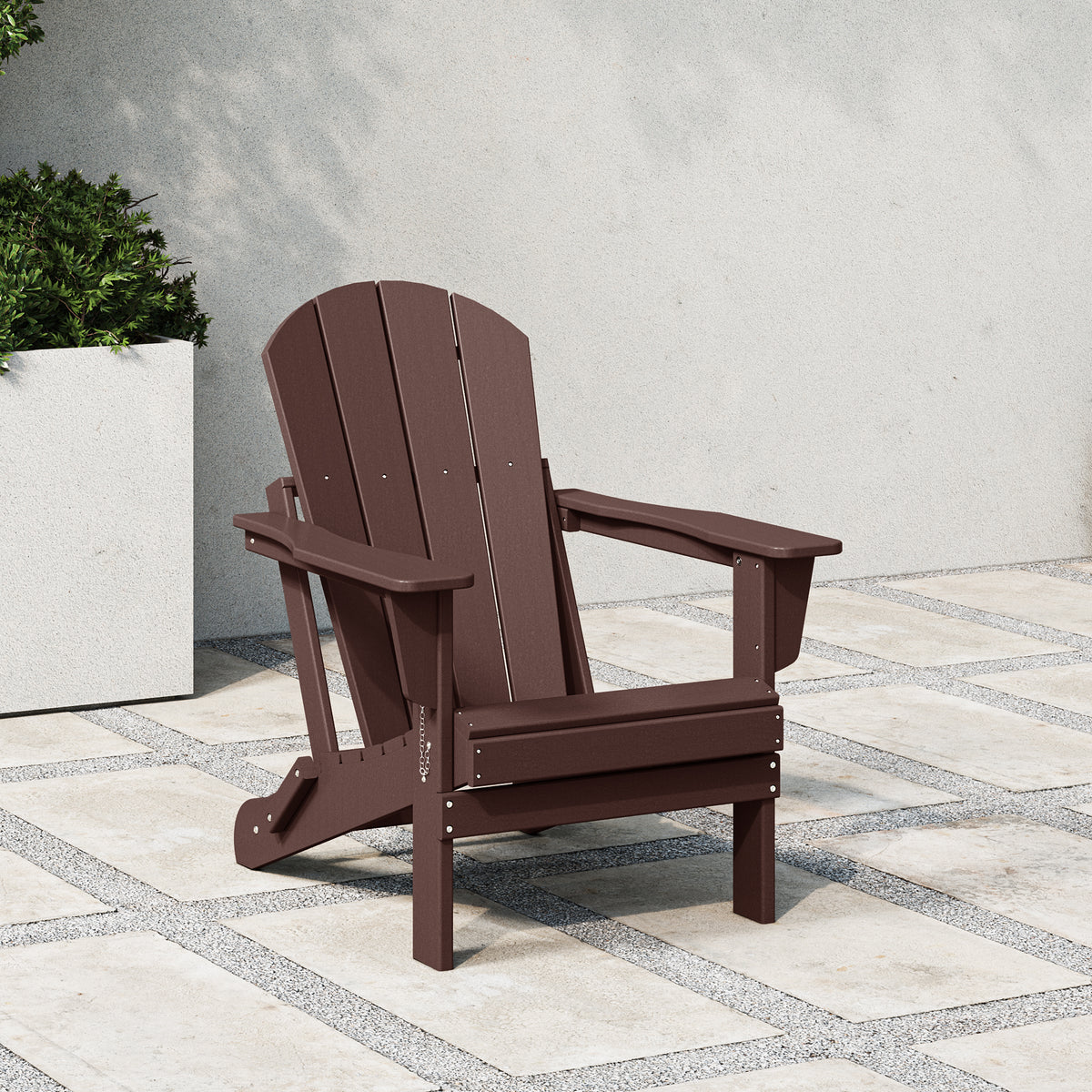 Malibu folding Adirondack chair in Dark Brown styled outdoors