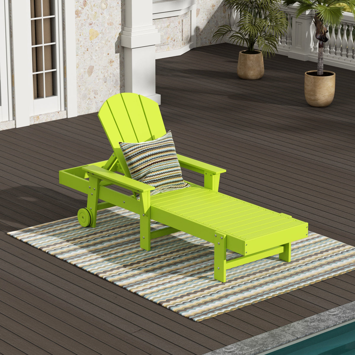 Malibu reclining chaise lounge with arms and wheels in Lime styled outdoors