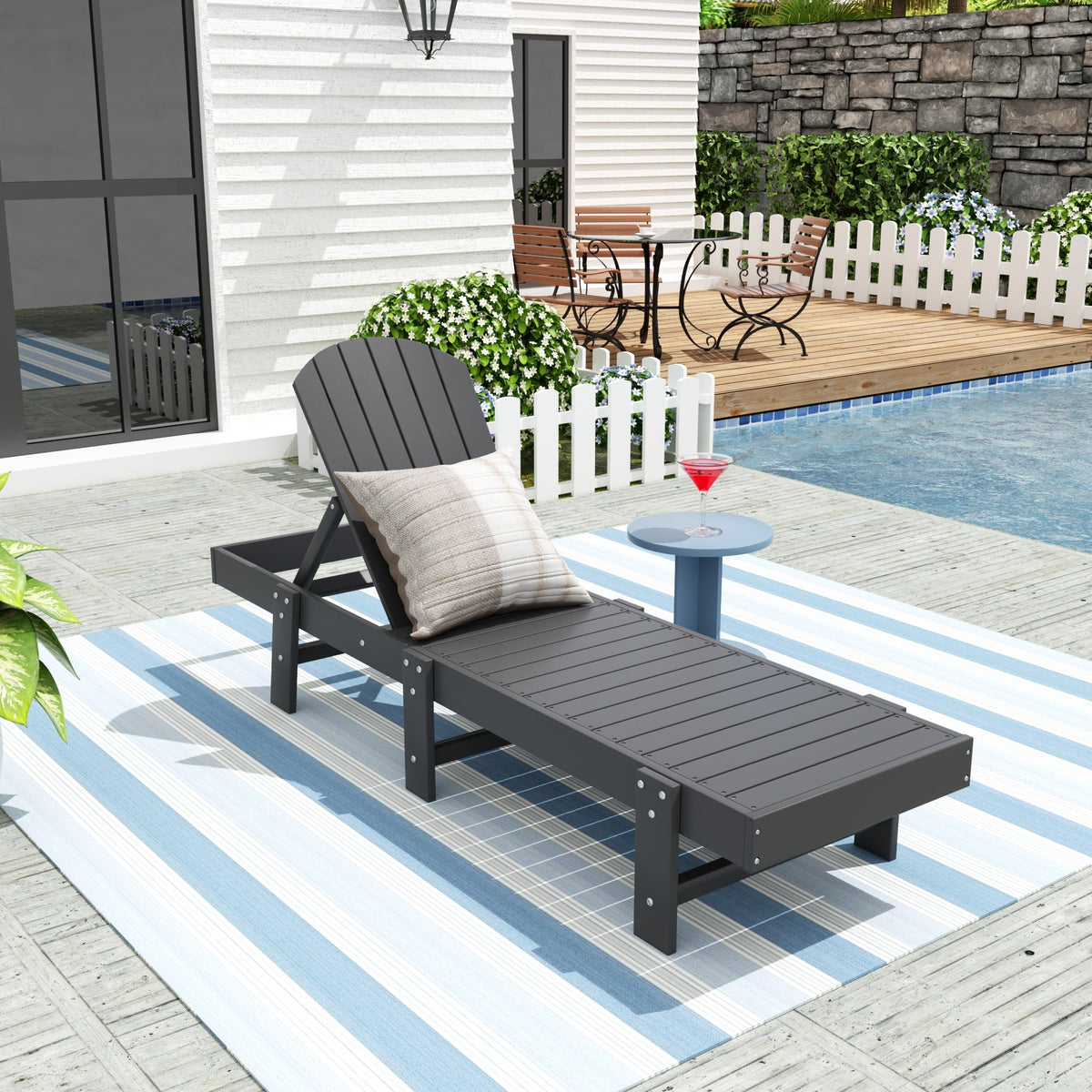 Dylan Adirondack reclining chaise lounge in Gray styled outdoors