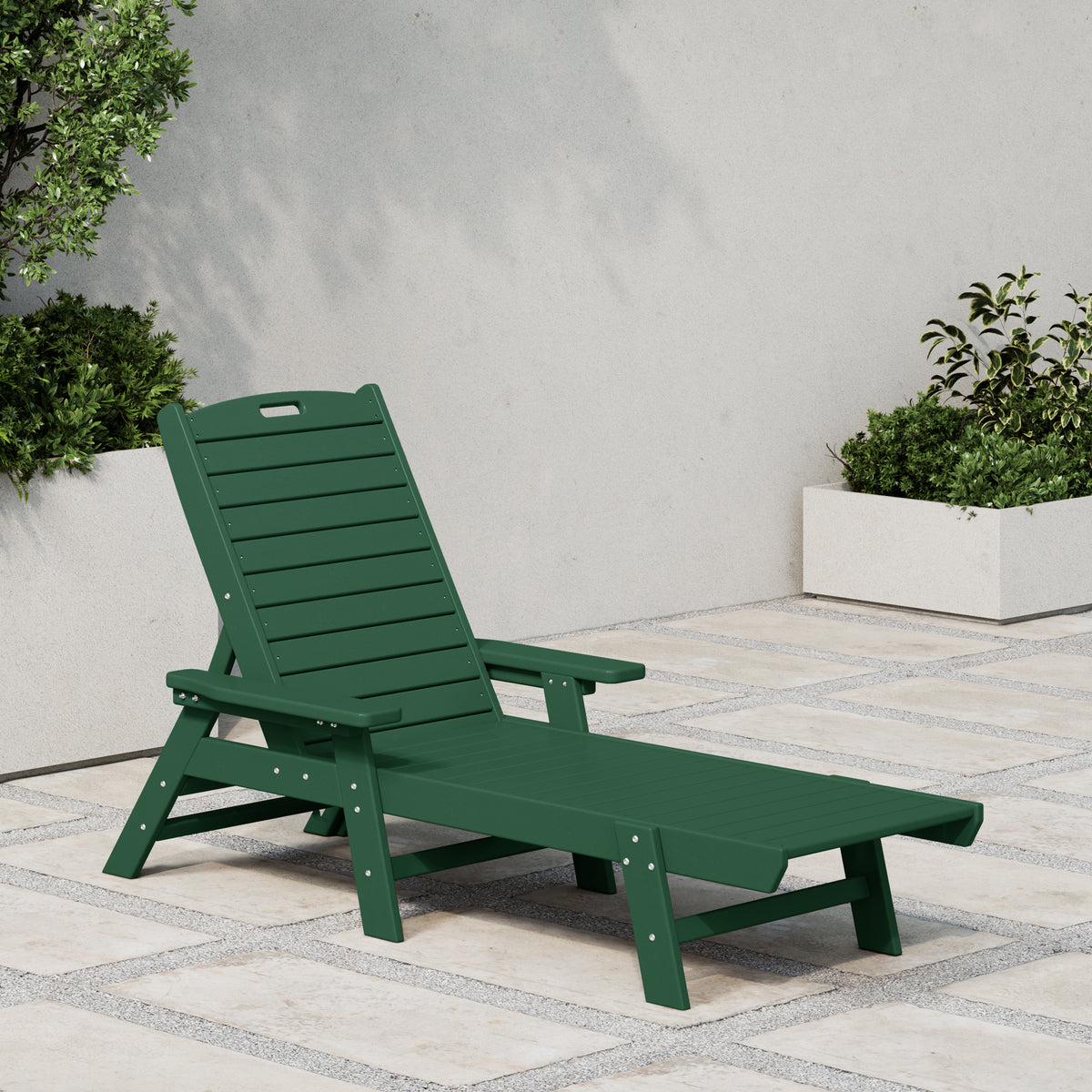 Malibu reclining chaise lounge in Dark Green styled outdoors