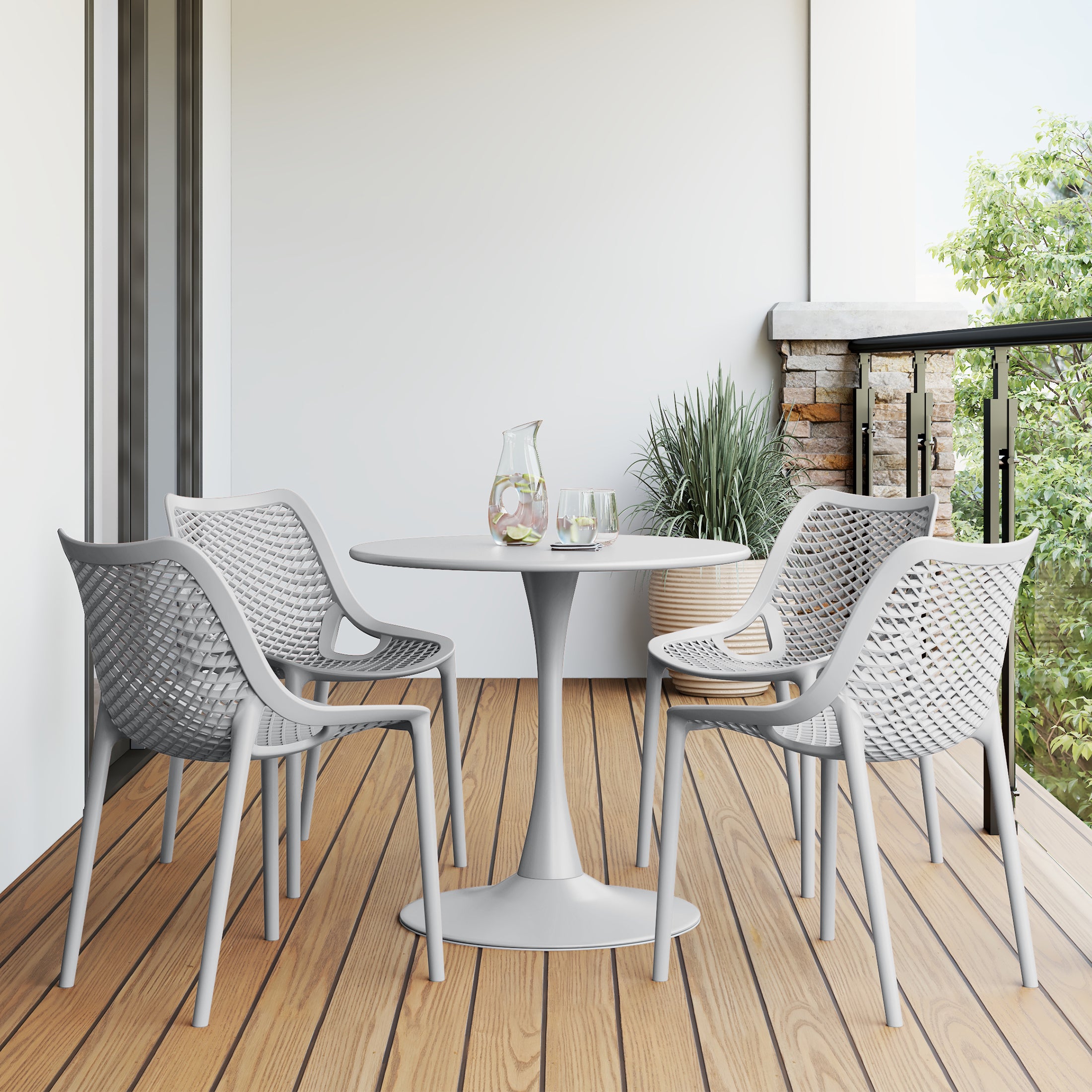 Playa 5-Piece Outdoor Indoor Round Metal Dining Table Set And Stackable Resin Patio Dining Side Chairs