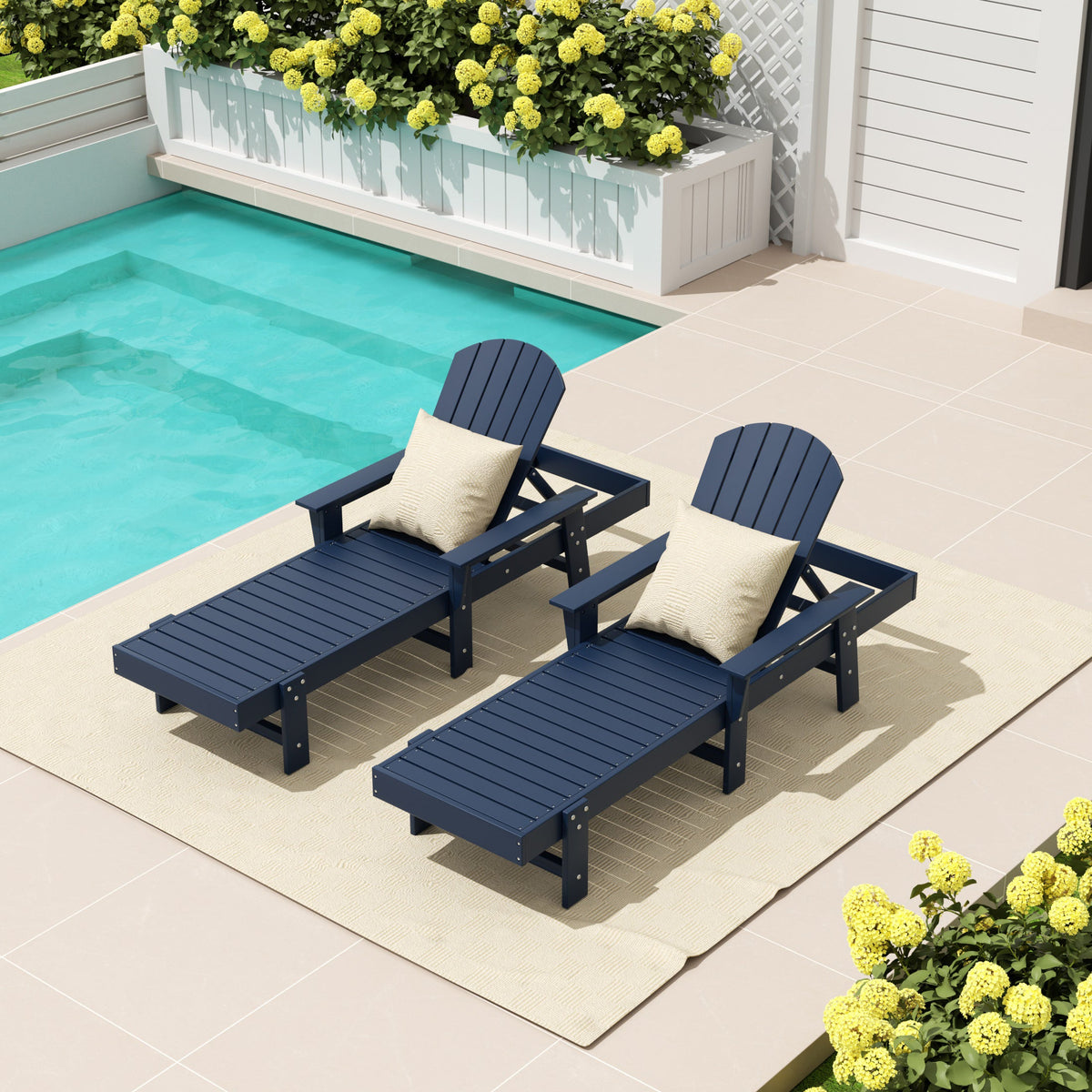 Dylan Adirondack reclining chaise lounge with arms in Navy Blue styled outdoors