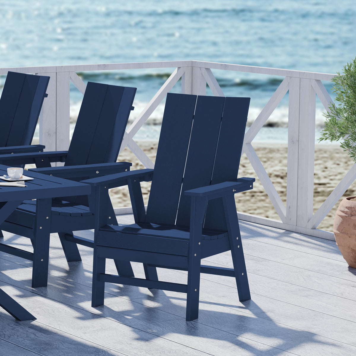 Ashore modern Adirondack dining chair in Navy Blue styled outdoors
