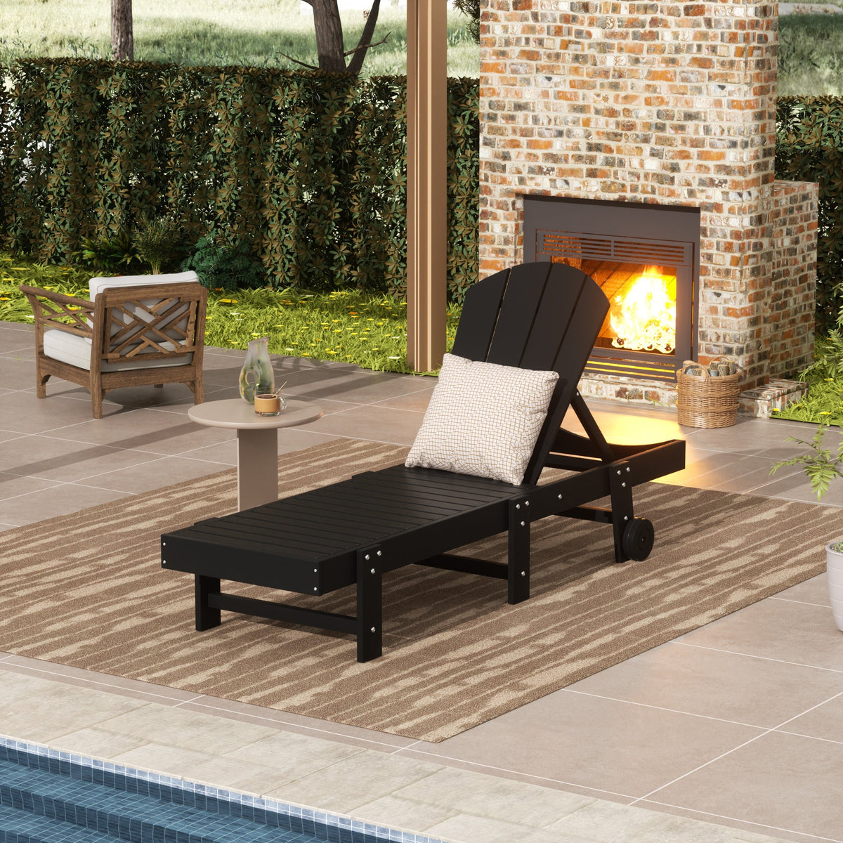 Malibu Adirondack reclining chaise lounge with wheels in Black styled outdoors