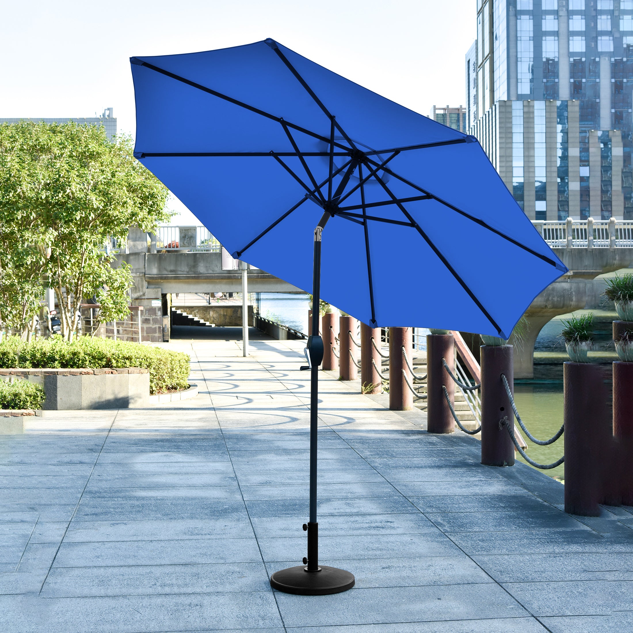 9 ft patio umbrella with base Cabana ft. Table tilt and crank features so its just right for providing ample shade over dining tables and larger conversation areas WestinTrends 9 ft Outdoor Patio