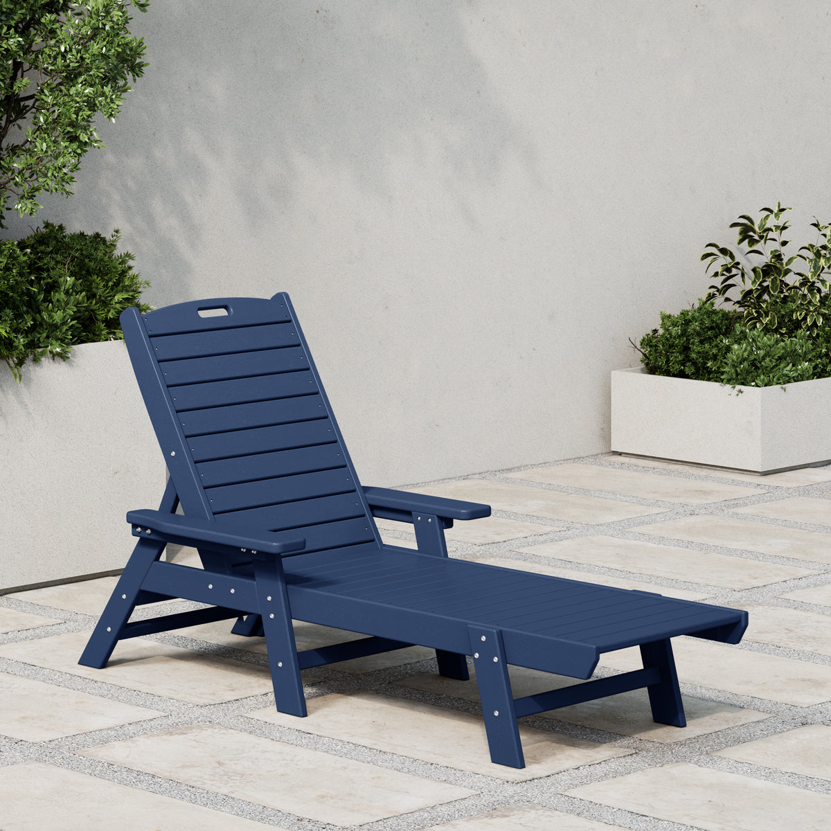 Malibu reclining chaise lounge in Navy Blue styled outdoors