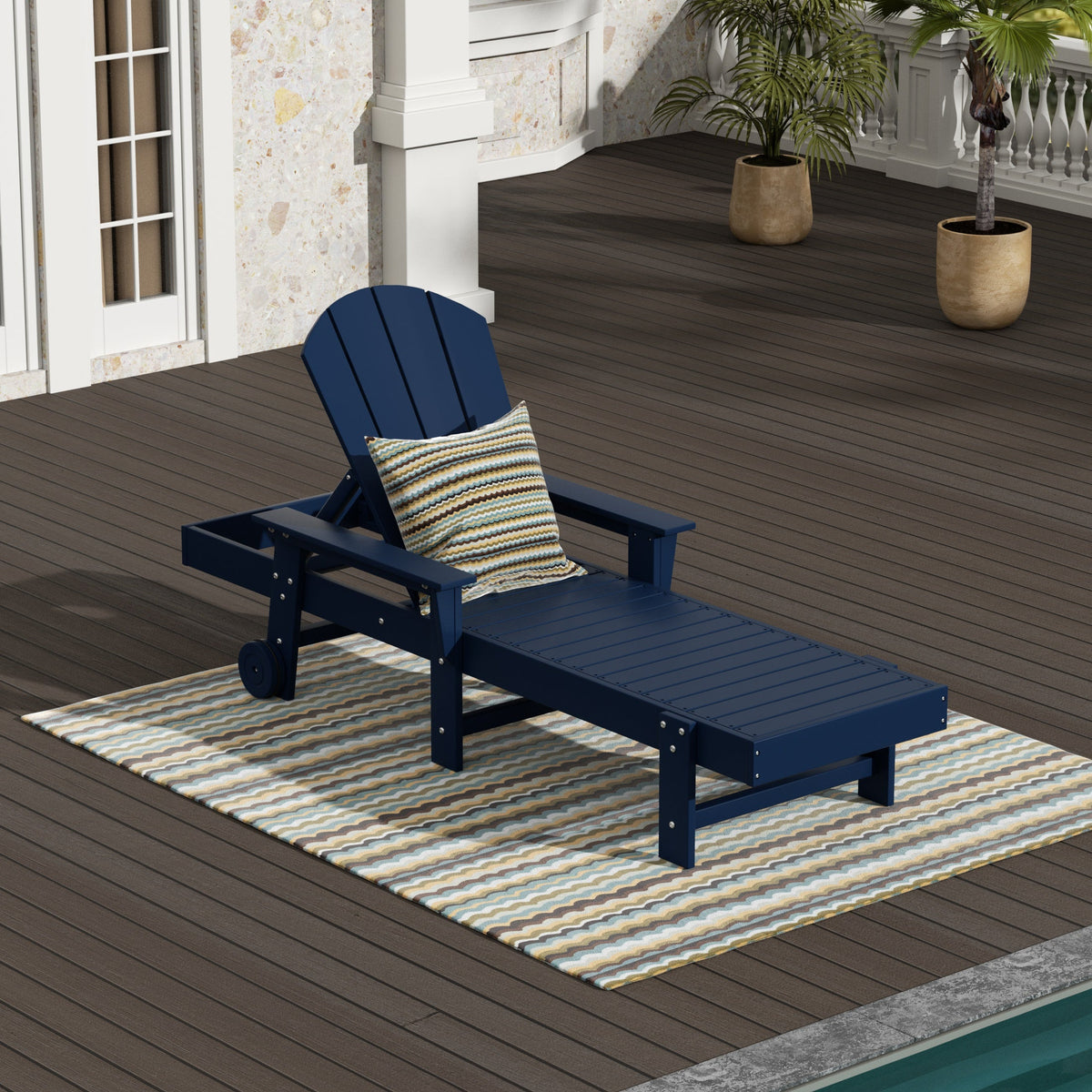 Malibu reclining chaise lounge with arms and wheels in Navy Blue styled outdoors