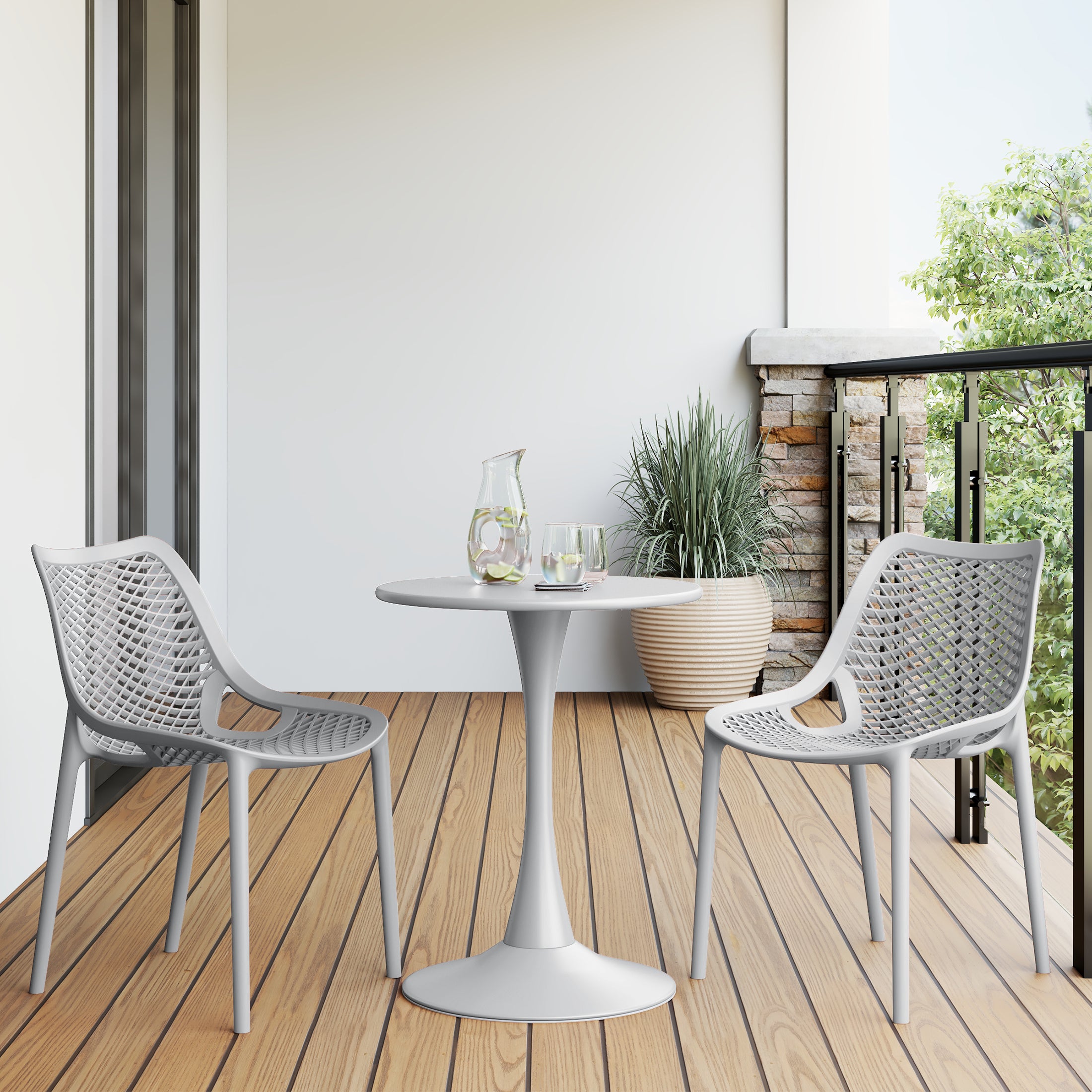 Playa 3-Piece Outdoor Round Metal Dining Table Set And Stackable Resin Patio Dining Side Chairs
